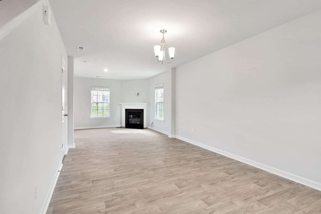 Interior house painting project showing modern living room transformation